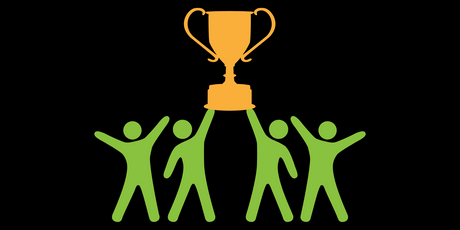 Four green people holding up a gold trophy