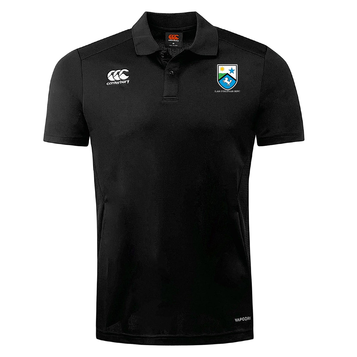 The Las Colinas Rugby Club Dry Polo by EMB Canterbury is a black short-sleeve polo with collar, featuring the Canterbury logo and a blue/white shield crest on the chest. Vapodri Technology ensures maximum breathability.