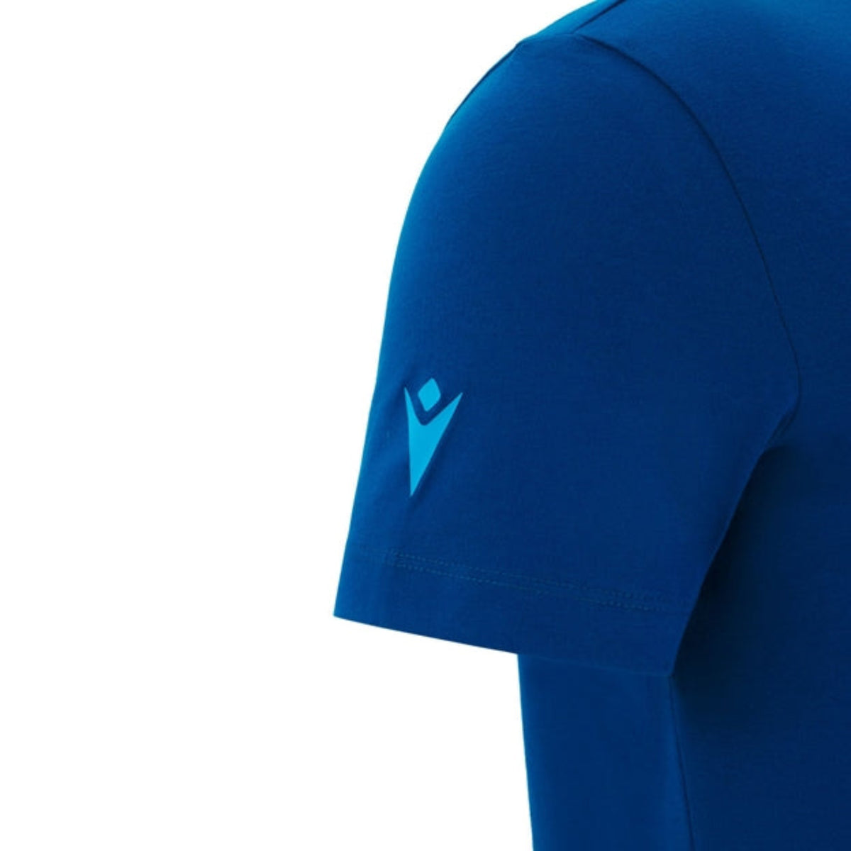 A close-up of the Scotland 25/26 Murrayfield Stadium T-Shirt by Macron, a blue short-sleeve top with a light blue logo on the left sleeve—ideal for supporting your team at Murrayfield Stadium.