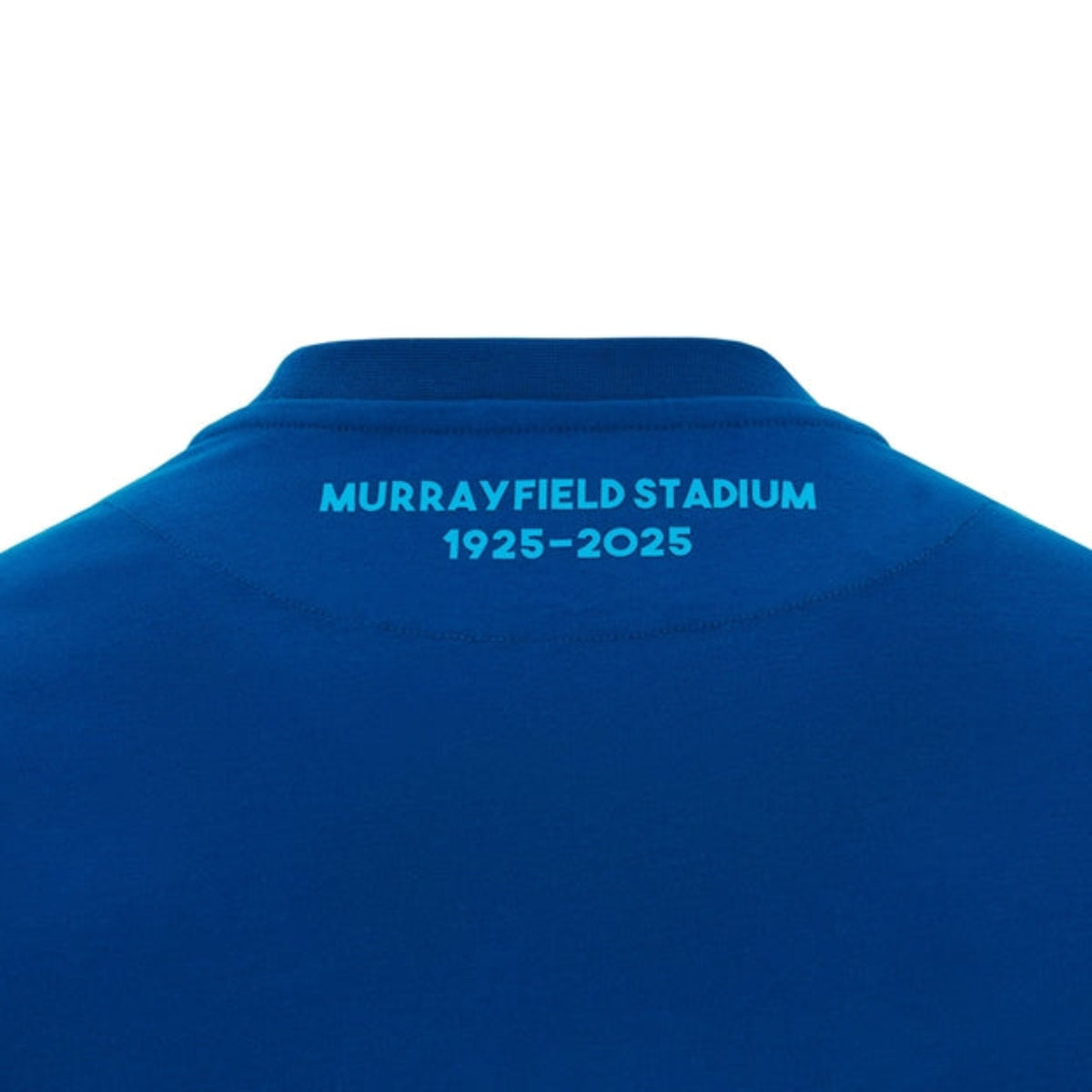 Back view of the Scotland 25/26 Murrayfield Stadium T-Shirt by Macron, with "MURRAYFIELD STADIUM 1925-2025" in light blue near the collar.
