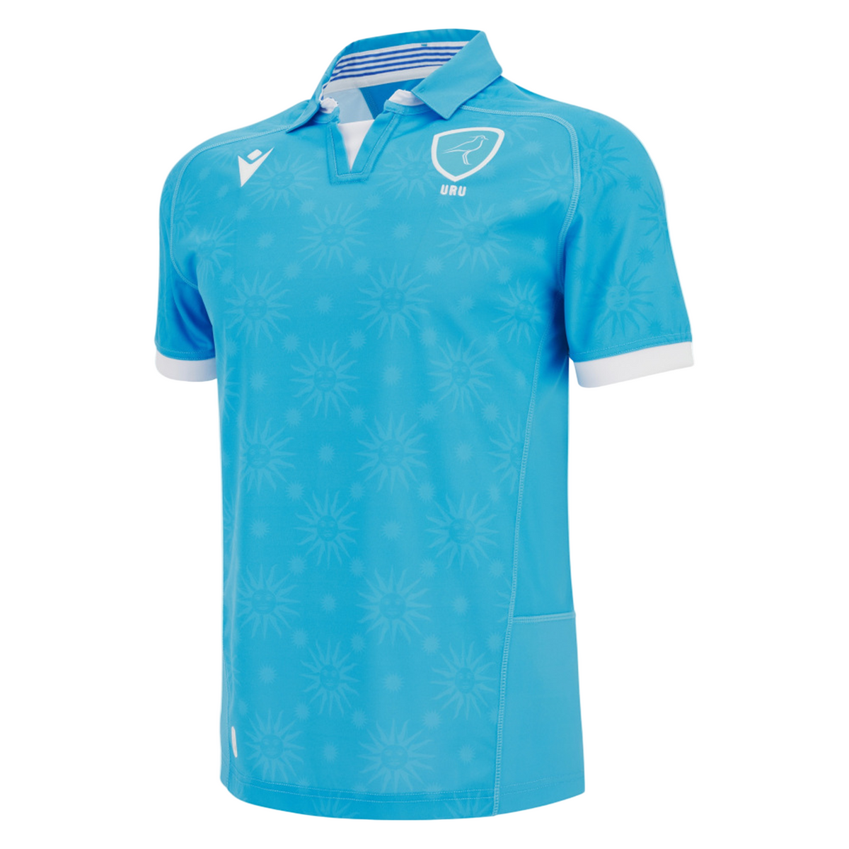 Show your support with the Uruguay URU 25/26 Replica Home Jersey by Macron—a light blue, short-sleeve jersey featuring white details, subtle sunburst patterns, and the team badge for an authentic fan look.