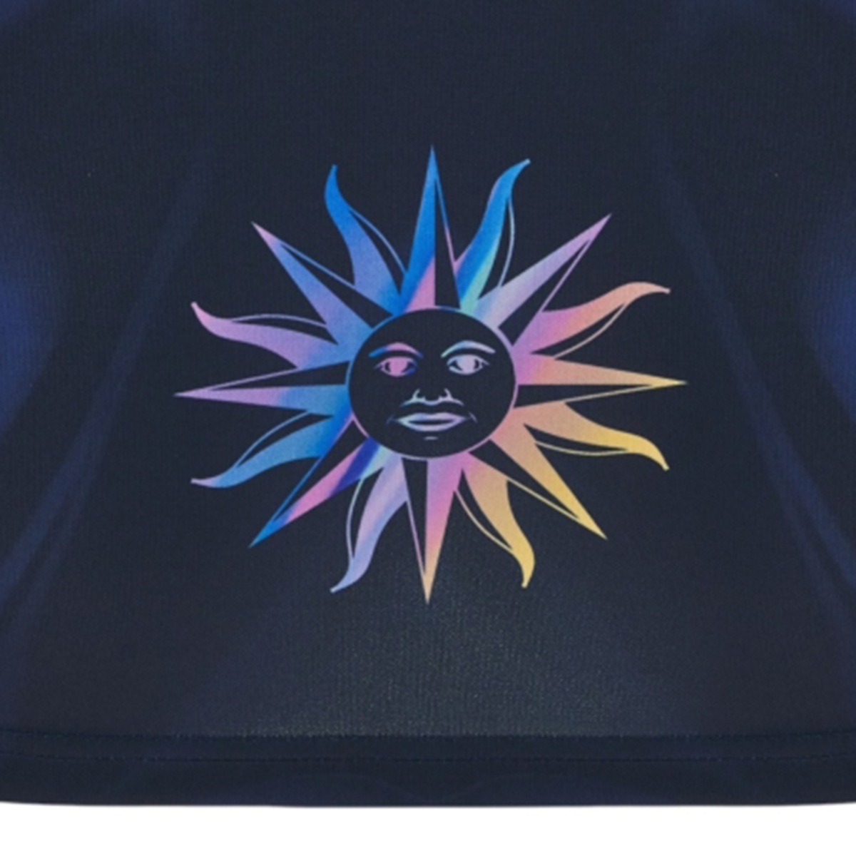A stylized sun with a human face and multicolored rays on a dark background, inspired by the Uruguay URU 25/26 Replica Training Jersey from Macron.