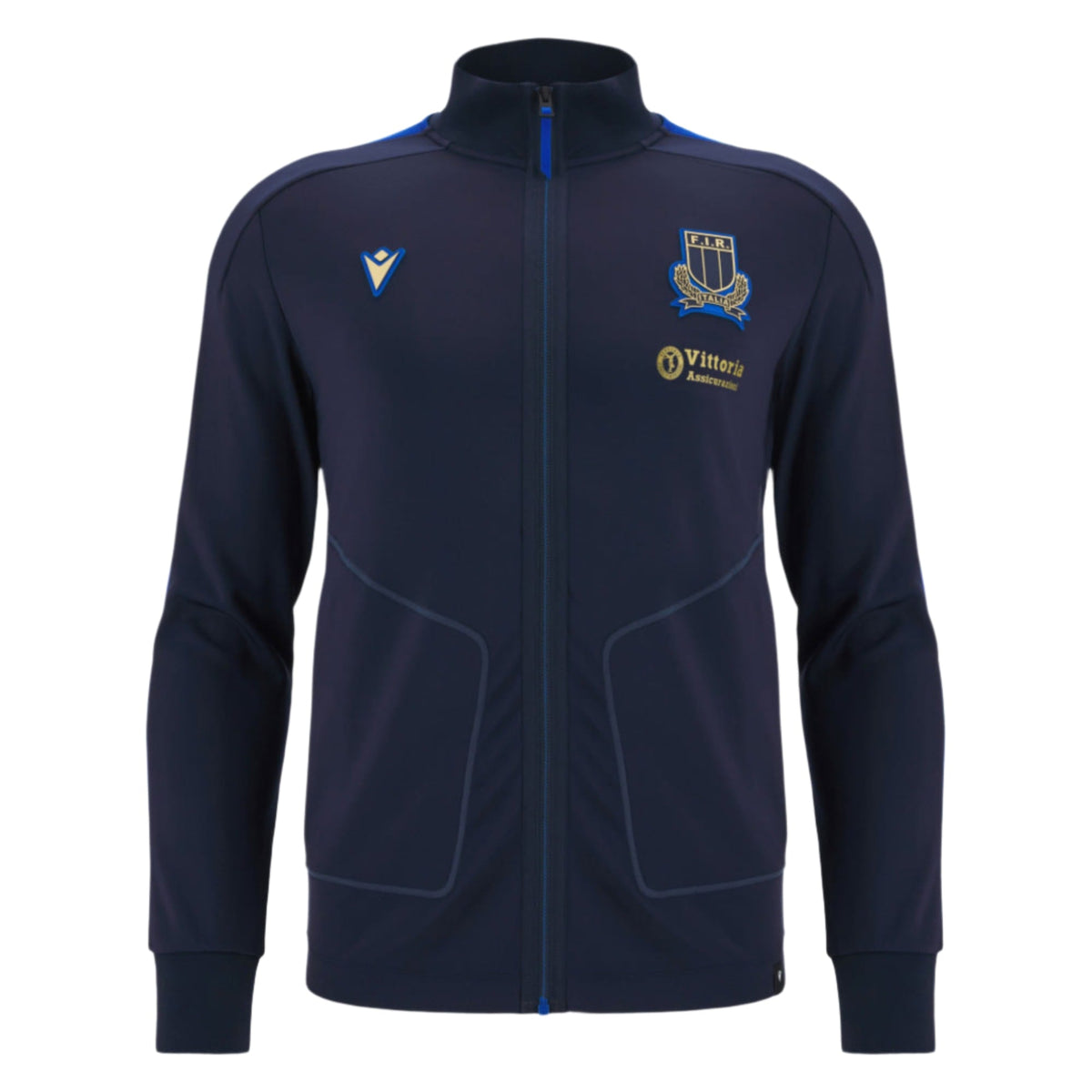 The Italy 25/26 Anthem Jacket by Macron features a navy blue zip-up design with a high collar, two side pockets, and embroidered chest logos, combining classic style and sporty elegance inspired by Italia Rugby.