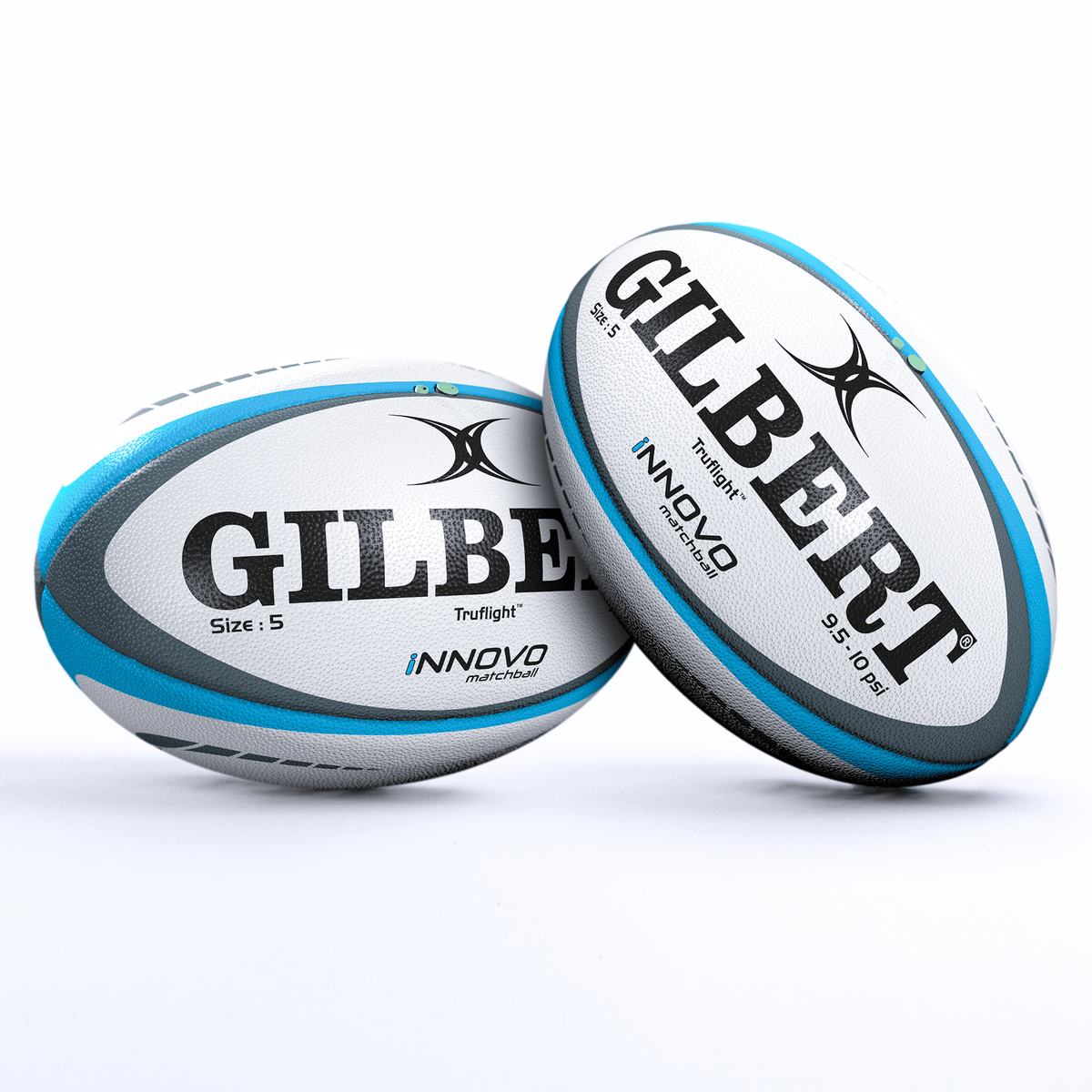 Two Gilbert Innovo Match Balls, white with blue and black accents, showcasing the "Trulight" and "Innovo Match Ball" labels, stand side by side against a plain background. Perfect for rugby enthusiasts who appreciate quality and Gilbert branding.