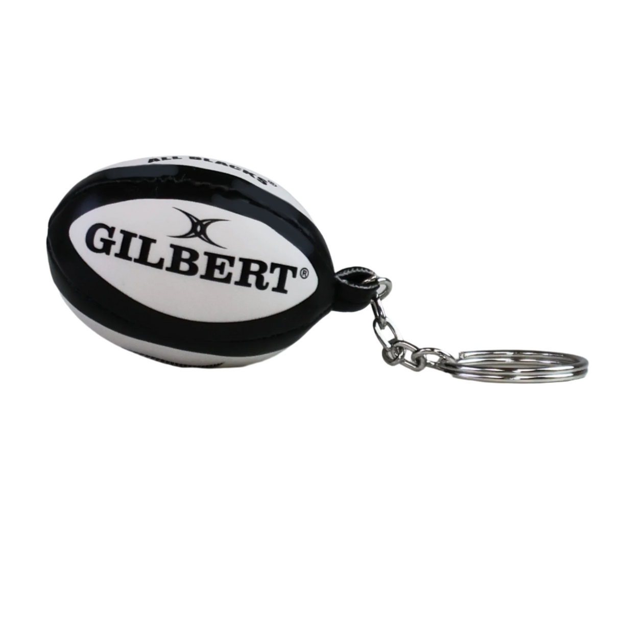 The All Blacks Ball Keyring by Gilbert is a small rugby ball keychain with "GILBERT" branding, ideal for any rugby fan's collection; shown on a white surface against a plain background.