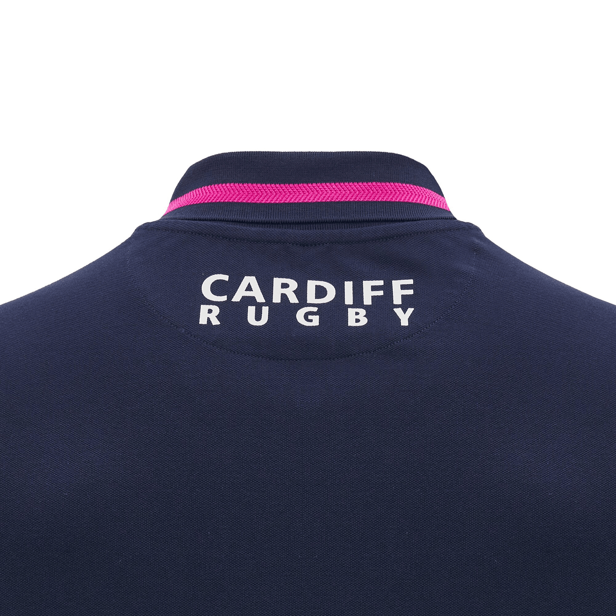 This navy rugby shirt, designed by Macron, features the words "Cardiff Rugby" in white on the back and includes a pink stripe on the collar. Perfect for fans of the 24/25 season, it embodies the essence of the Cardiff 24/25 Anthem Travel Polo by Macron.