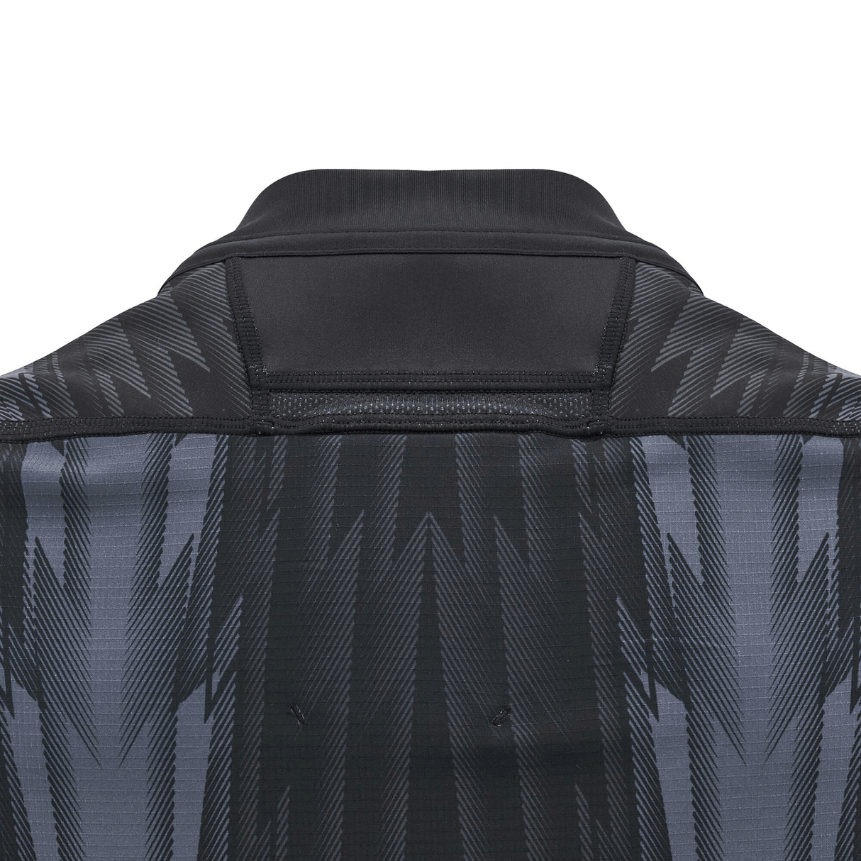 Close-up of the back of a black and gray patterned jacket with a standing collar, reminiscent of the sleek design of the Wales 24/25 Training Jersey by Macron.