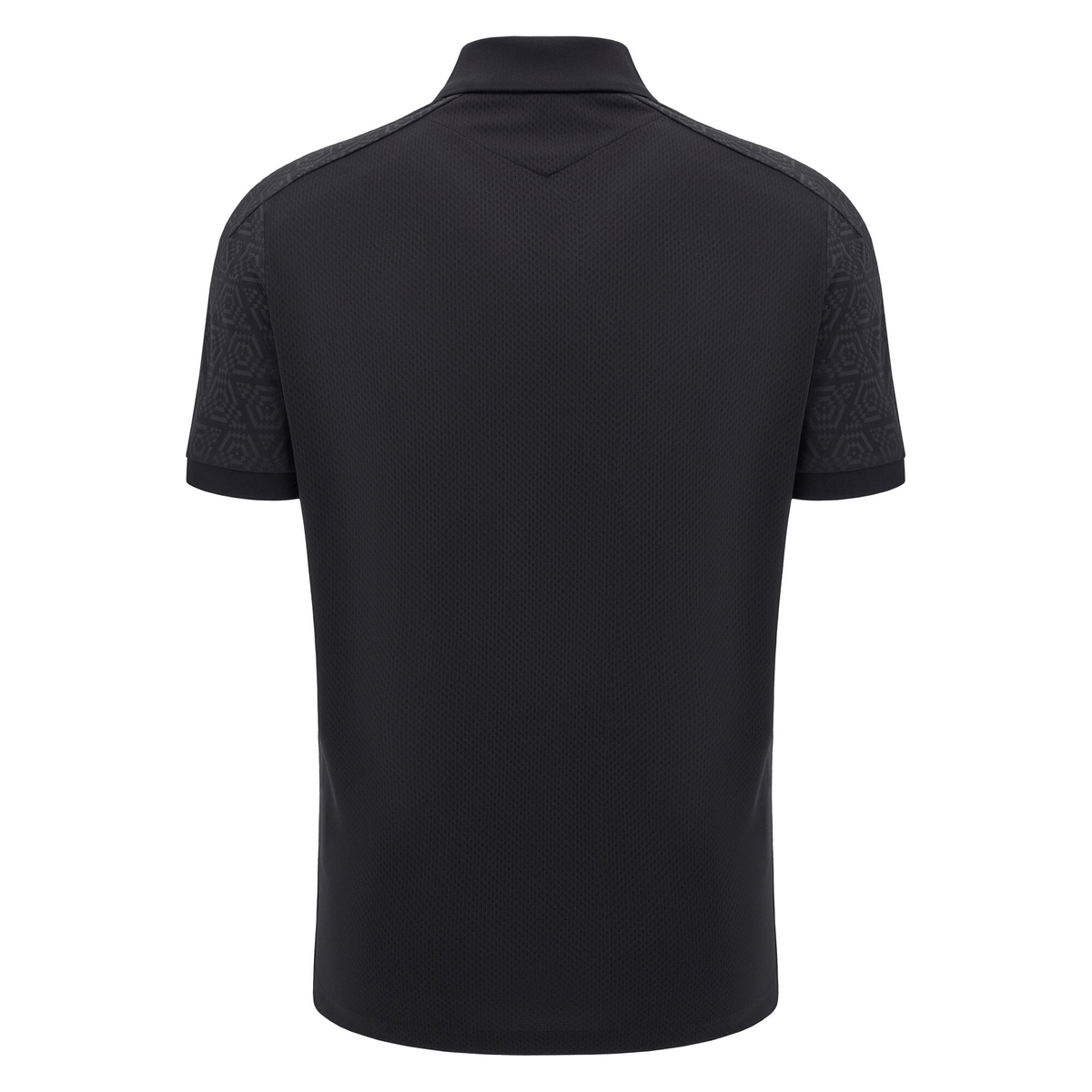 View of the back of the Wales 24/25 Travel Polo by Macron in black, showcasing short sleeves, a collar, and patterned shoulders.