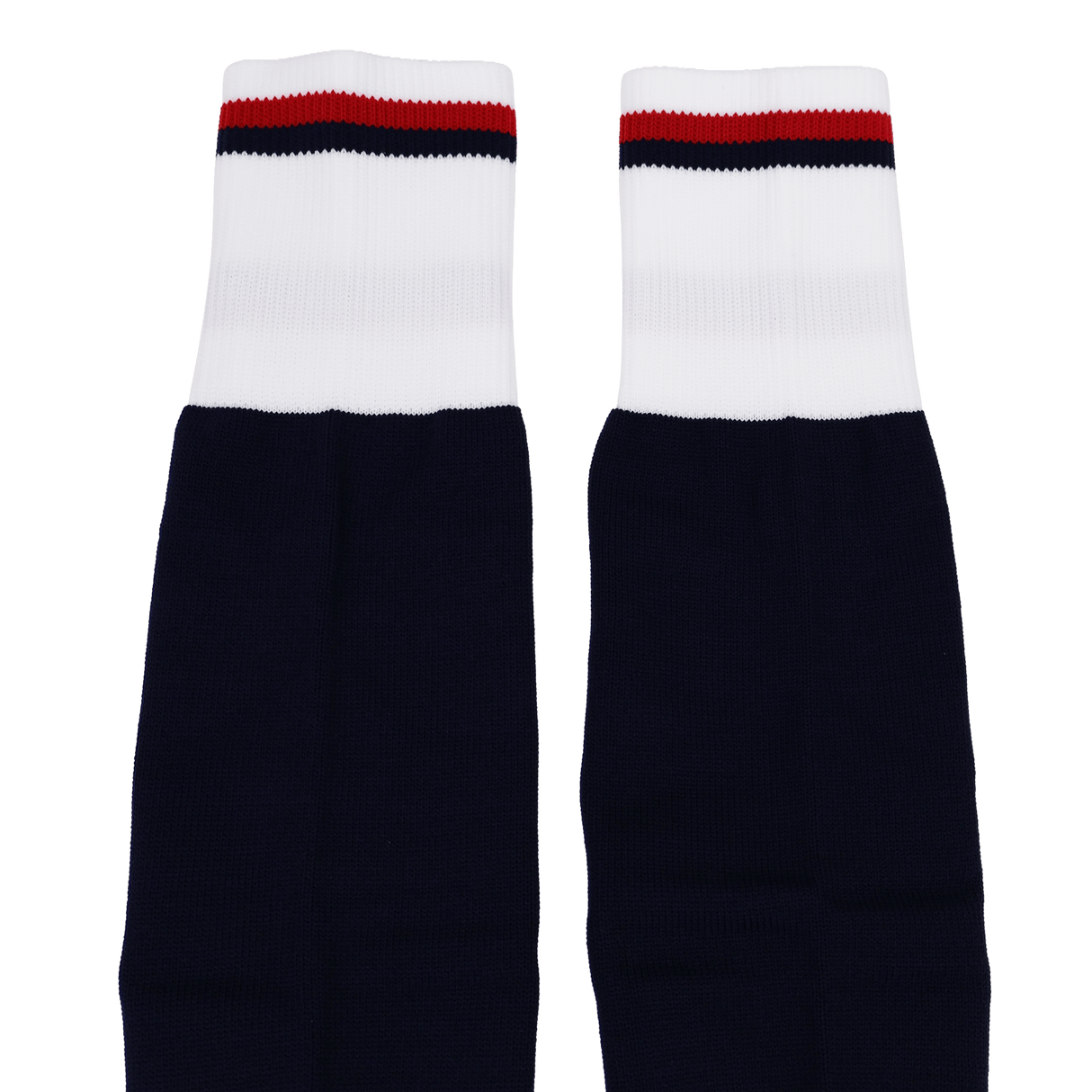 The USA Rugby 24/25 Replica Home Socks by Macron are navy blue with white cuffs featuring red and black stripes at the top, shown laid flat side by side on a white background.