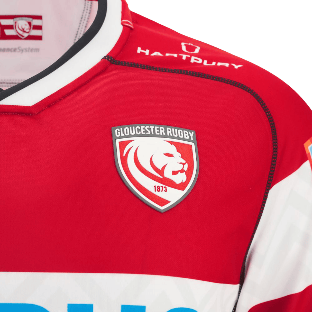 Close-up of the Gloucester 25/26 Replica Home Jersey by Macron, featuring the iconic lion crest and sponsor logos—a must-have for dedicated fans.
