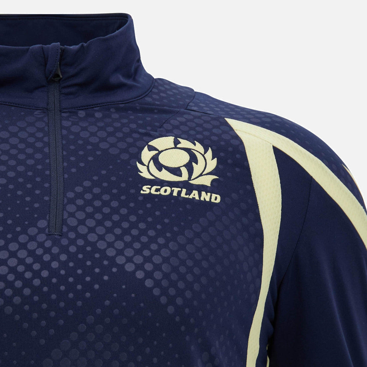 Get a closer look at the Scotland SRU 26/27 Training 1/4 Zip by Macron—a navy blue training top with light yellow accents, featuring the iconic Scotland rugby logo and "Scotland" printed on the chest. This Macron design blends performance and style, making it ideal for both fans and athletes.