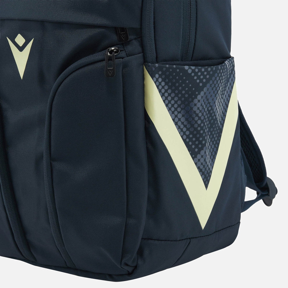 Close-up of the Scotland SRU 26/27 Backpack by Macron—a dark blue backpack featuring light-colored chevron designs and a zippered pocket.