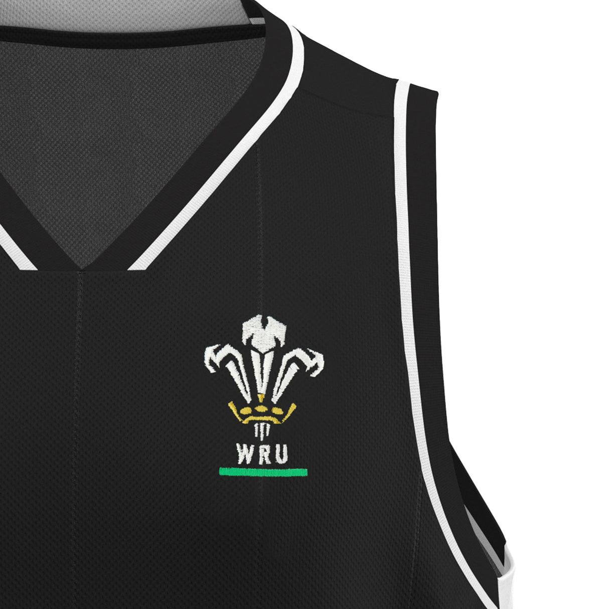 A close-up of the Wales WRU 26/27 Travel Basketball Singlet by Macron, a black sports jersey with white trim featuring the embroidered Welsh Rugby Union (WRU) logo on the chest, showcasing a classic design by Macron.