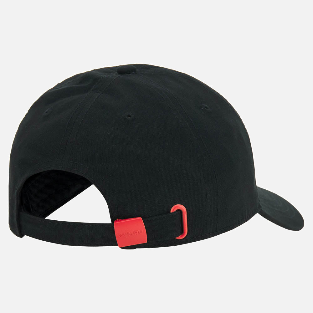Back view of the black Wales WRU 26/27 Dad Cap by Macron, featuring an adjustable strap with a red buckle and a curved brim.