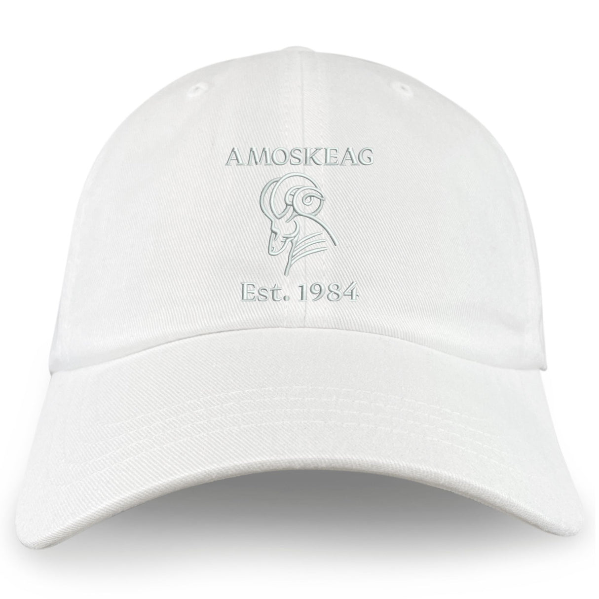 The Amoskeag Rugby Club Adult Low-Profile Cotton Twill Dad Cap by EMB S&S Activewear is a white dad cap featuring an embroidered outline ram's head and "AMOSKEAG Est. 1984" on the front.