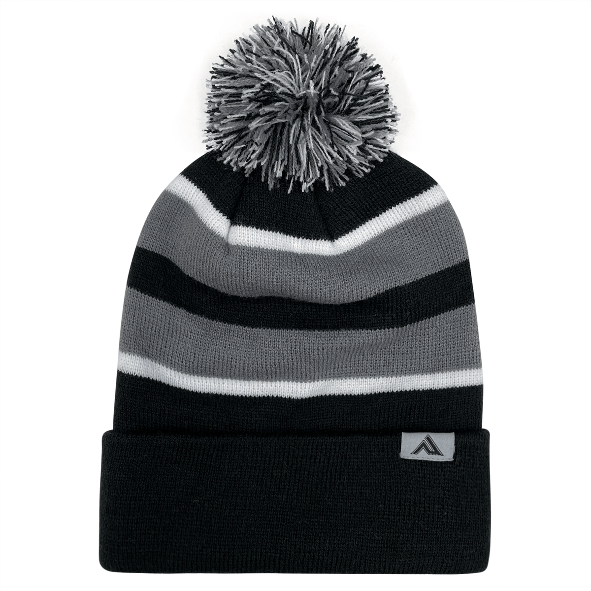 A black and gray contrast striped Hooped Knit Fold Over Pom-Pom Beanie made with acrylic fabric by Augusta Sportswear.