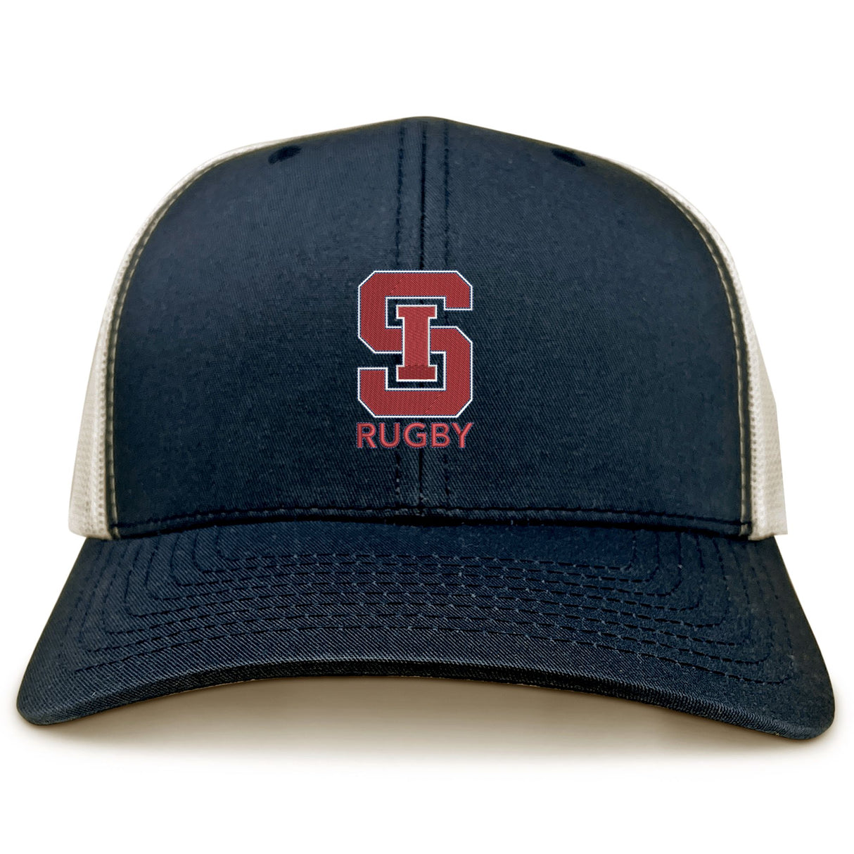 The St. Ignatius Rugby Retro Trucker Cap by EMB S&S Activewear features a navy blue and white design, red and white embroidered "S" logo with "RUGBY" on front, and an adjustable snapback closure.