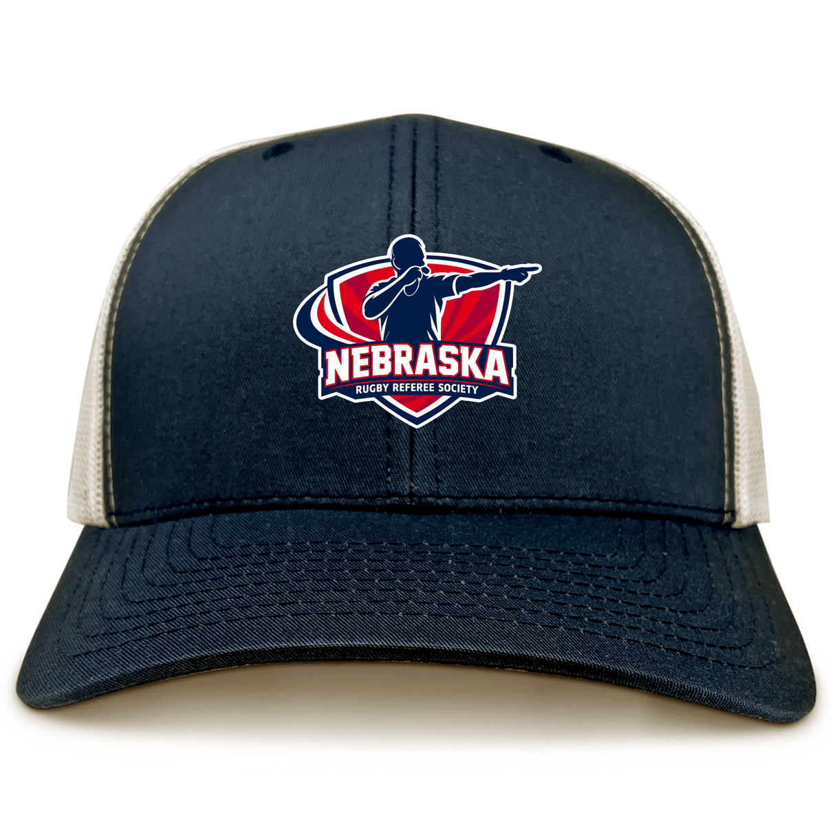The EMB S&S Activewear Nebraska Rugby Referee Society Retro Trucker Cap features a navy and beige design, an embroidered referee logo on the front panel, and a snapback closure for adjustable fit.