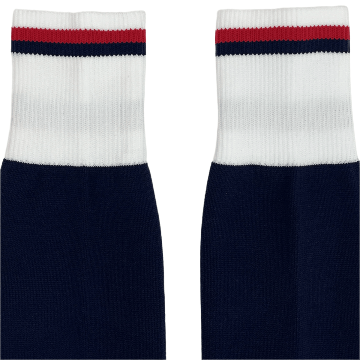 The USA Rugby 25 Matchday Home Socks by Macron are navy blue performance socks with white ribbed cuffs and red/navy stripes at the top, laid flat on a white background. Made with quality Renycle yarn for comfort.