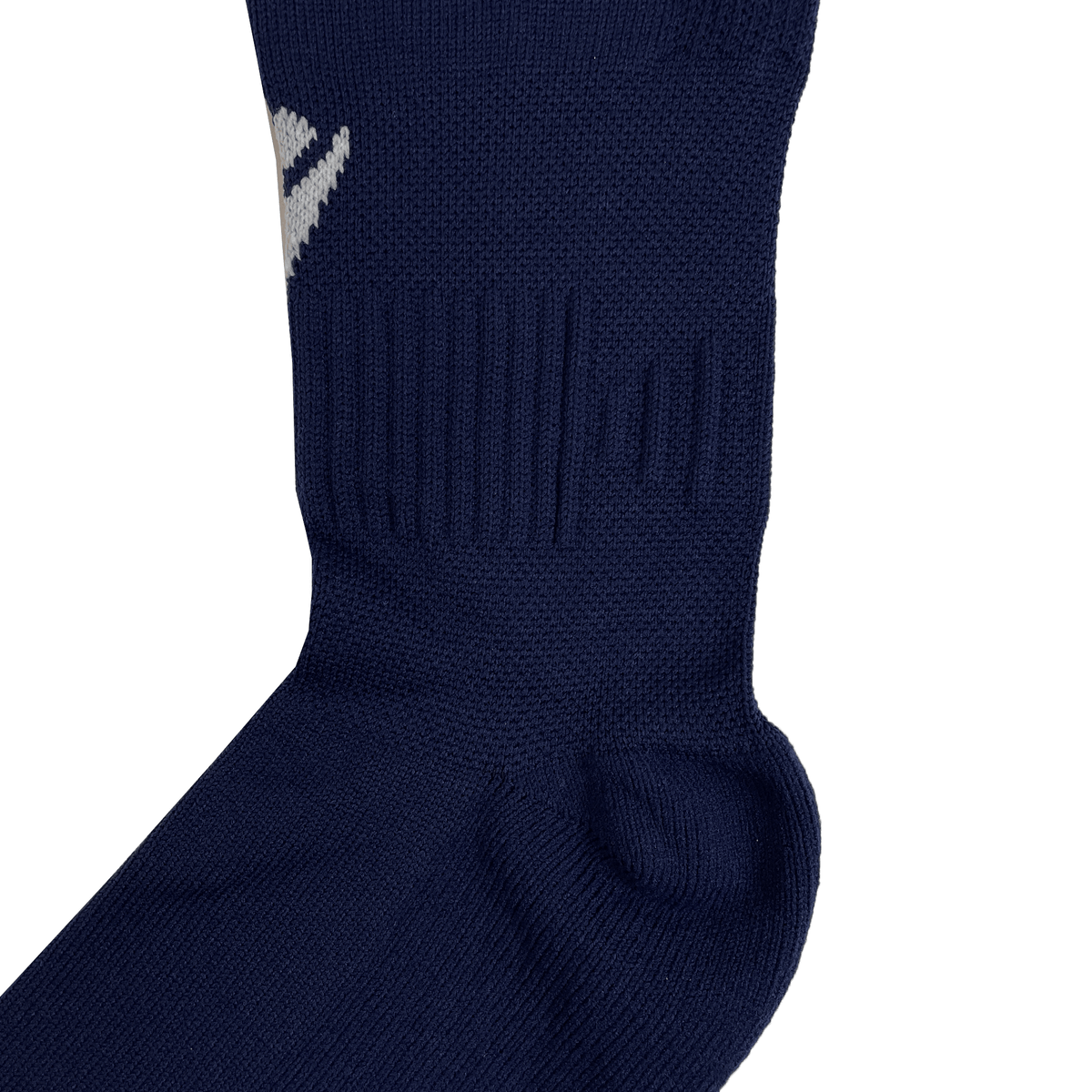 A close-up of the USA Rugby 25 Matchday Home Socks by Macron in navy, featuring ribbed detailing, Renycle yarn construction, and a small white Macron logo on the side.