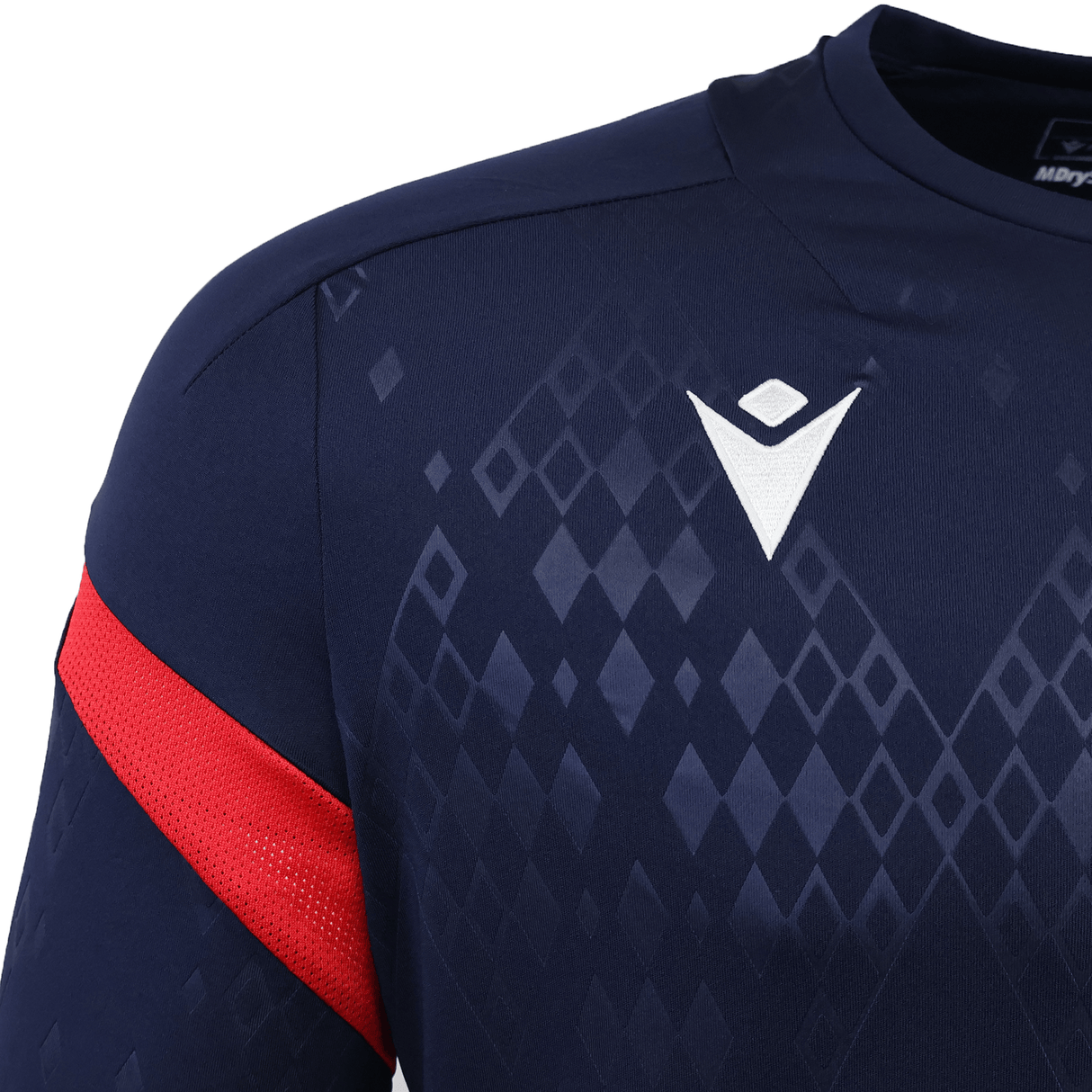 Close-up of the USA Rugby 25/26 LS Training Poly Shirt by Macron, featuring a navy geometric diamond pattern, white Macron logo, and red sleeve band—perfect blend of style and performance for dedicated athletes.