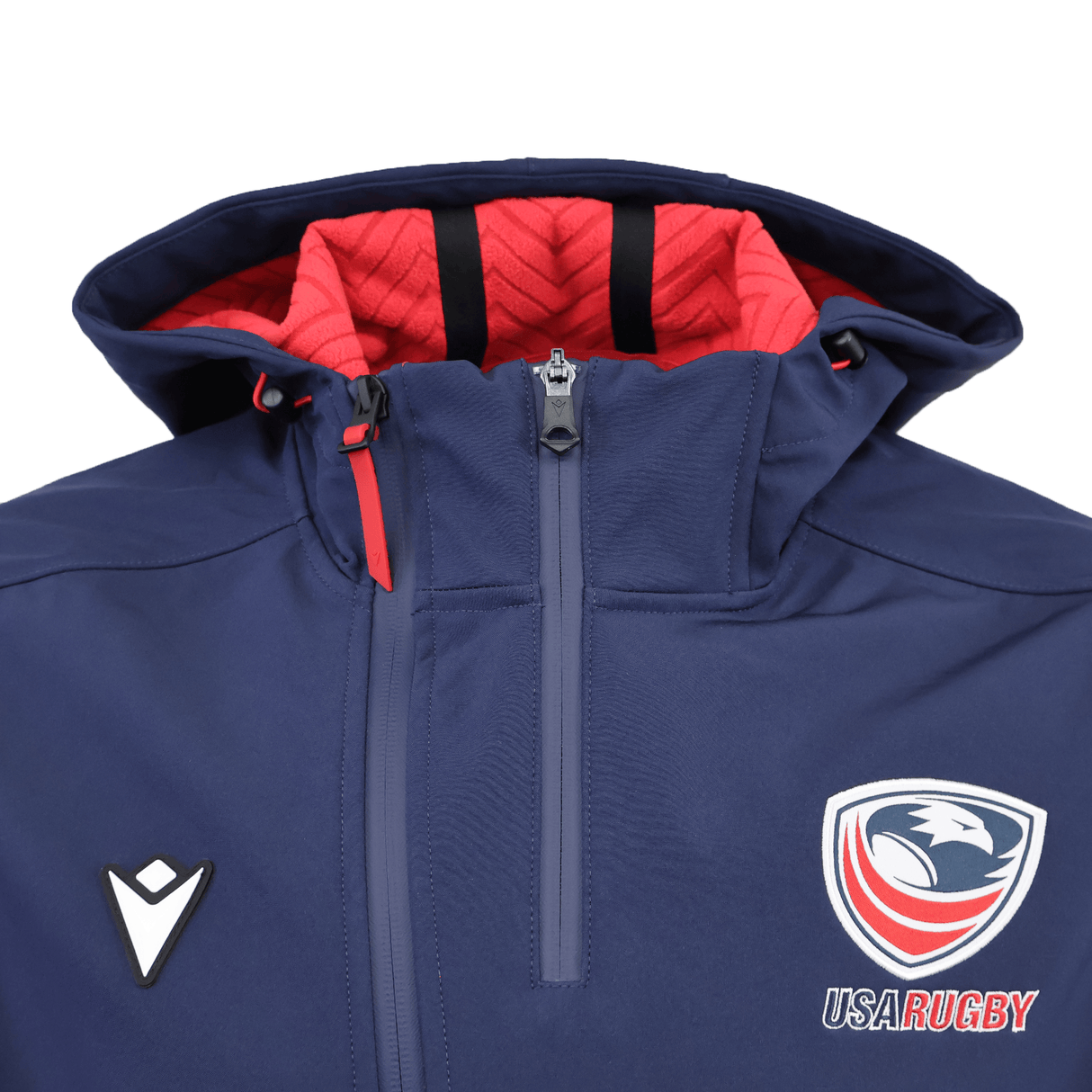 The USA Rugby 25/26 Athleisure Softshell Jacket by Macron features a navy design with red-lined hood, zipper closure, and white USA Rugby and Macron logos—offering a blend of style and function.