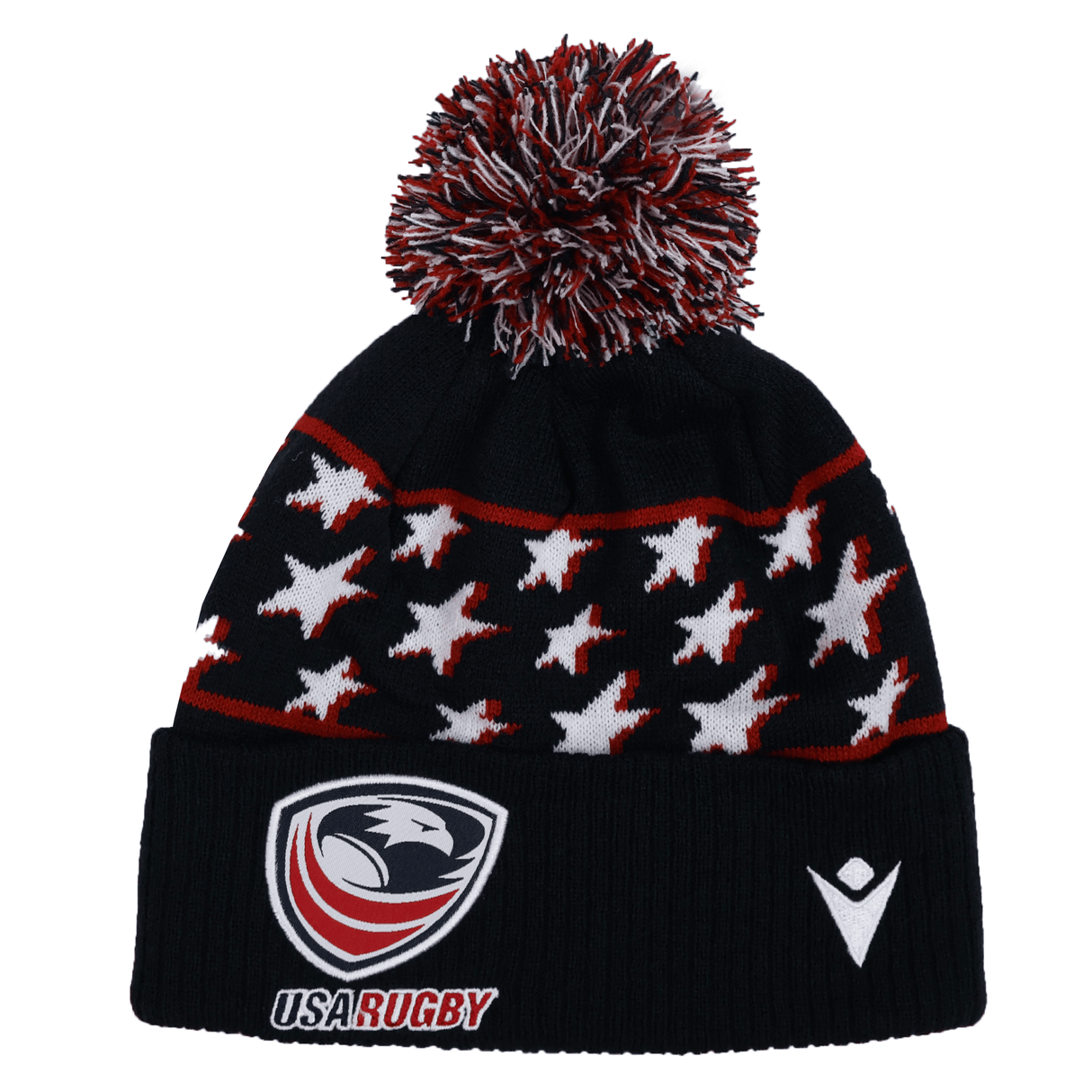 The USA Rugby 25/26 Pompom Beanie by Macron is a black acrylic knit hat featuring white stars, red accents, a top pom-pom, and embroidered USA Rugby and Macron logos on the front cuff.