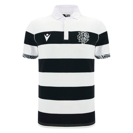 The Barbarians 25/26 Cotton Short Sleeve Home Jersey by Macron features black and white horizontal stripes, a white collar, cotton short sleeves, the Macron logo on the left chest, and a chevron on the right chest.