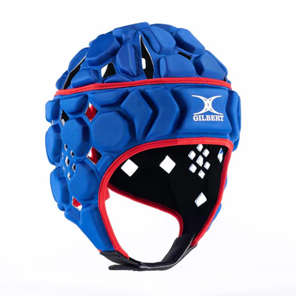 The Gilbert Octane Headguard by Gilbert features a blue padded design with distinctive hexagonal patterns, red trim, a black interior, and a white "Gilbert" logo on the front. It is engineered for a custom fit and equipped with protective padding to provide maximum comfort and safety on the field.