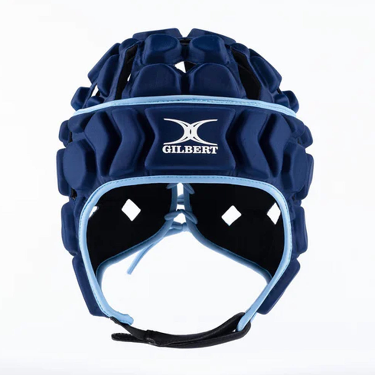 The Gilbert Octane Headguard, a padded navy blue rugby headguard with a chin strap and the Gilbert logo on the front, offers enhanced safety through its protective padding and is photographed against a plain white background.
