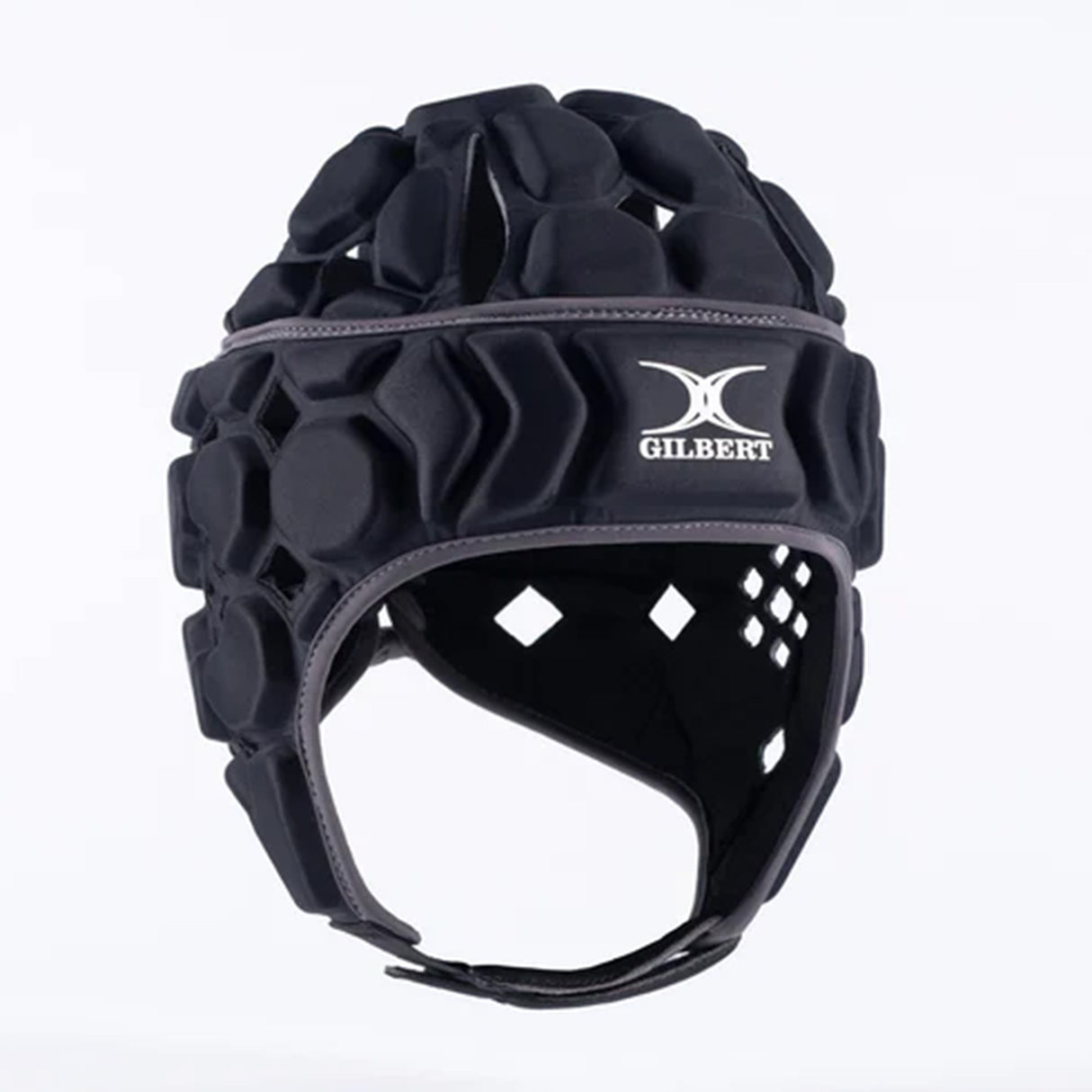 The Gilbert Octane Headguard is a black padded rugby headguard featuring hexagonal EVA padding, a secure chin strap, and the iconic "Gilbert" brand logo on the front. Displayed against a plain white background, this essential piece of protective gear is designed for rugby players.