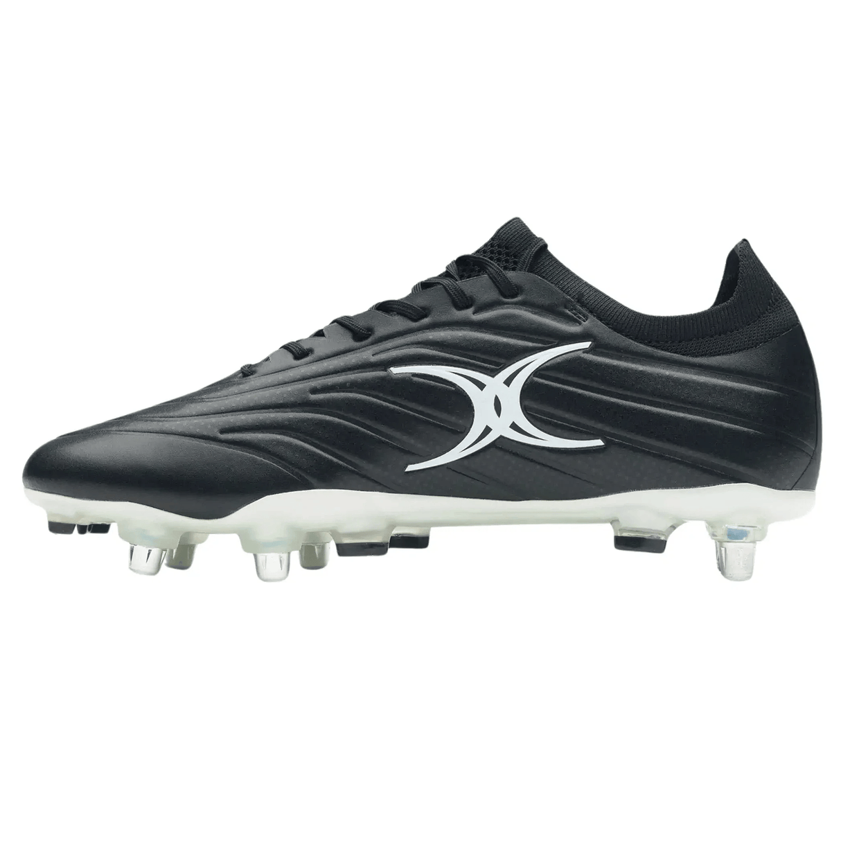 The Gilbert Icon X 6S SG - Black by Gilbert is a black soft ground soccer cleat with white accents, studs, and a large white logo on the side.