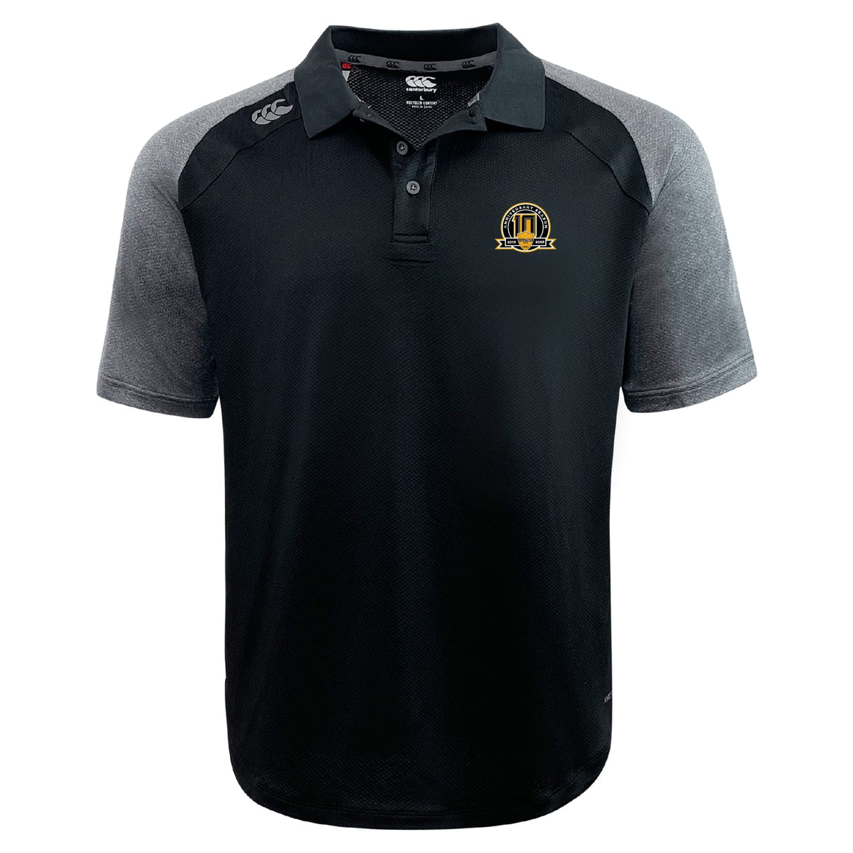 The Arrows Rugby Club 10th Anniversary Elite Polo by EMB Canterbury features black and grey short sleeves, a buttoned collar, grey shoulders and sleeves, an embroidered yellow and black chest logo, and lightweight Vapodri fabric for comfort.