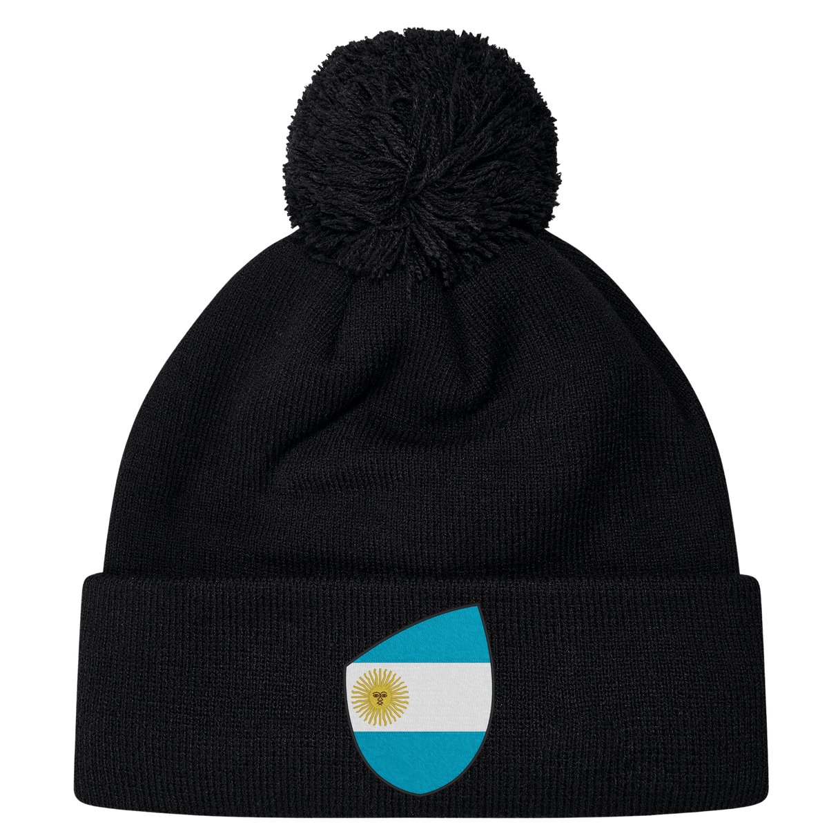 The Argentina Shield Pom Pom Beanie by EMB Canterbury is a black rugby beanie with a pom-pom and an Argentina shield patch on the folded brim.