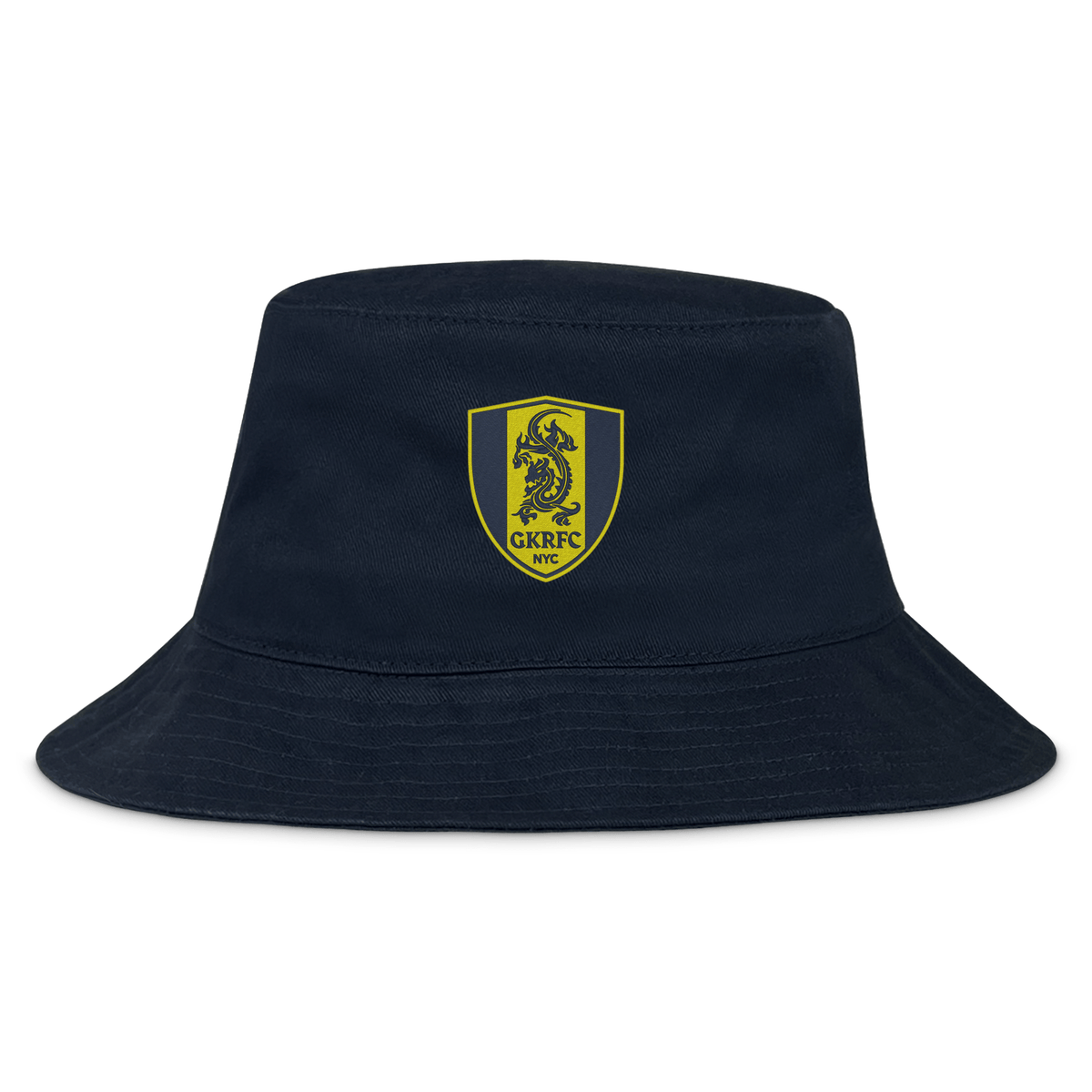 The EMB S&S Activewear Gotham Knights Crusher Bucket Cap is a navy blue cotton twill hat featuring a gold and black shield with a dragon and “GKRFC NYC” on the front, combining stylish design with sun protection.