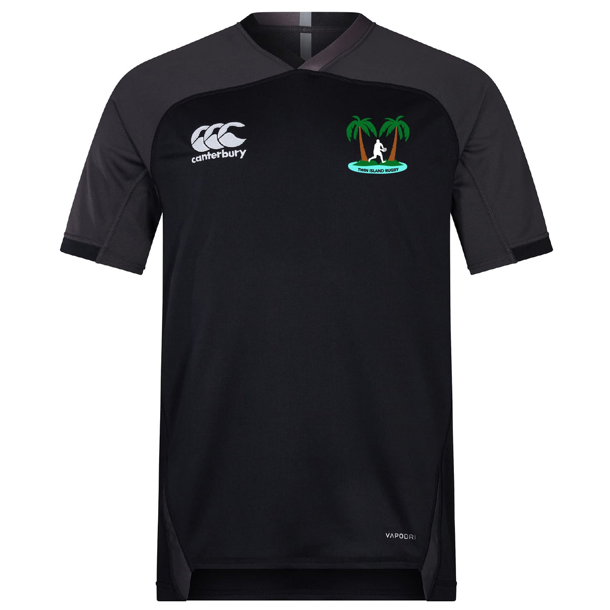 The Twin Island Rugby Vapodri Evader Jersey by EMB Canterbury is a black short-sleeve rugby top with a white chest logo and palm tree emblem, featuring moisture-wicking technology and "VapoDri" text near the hem.