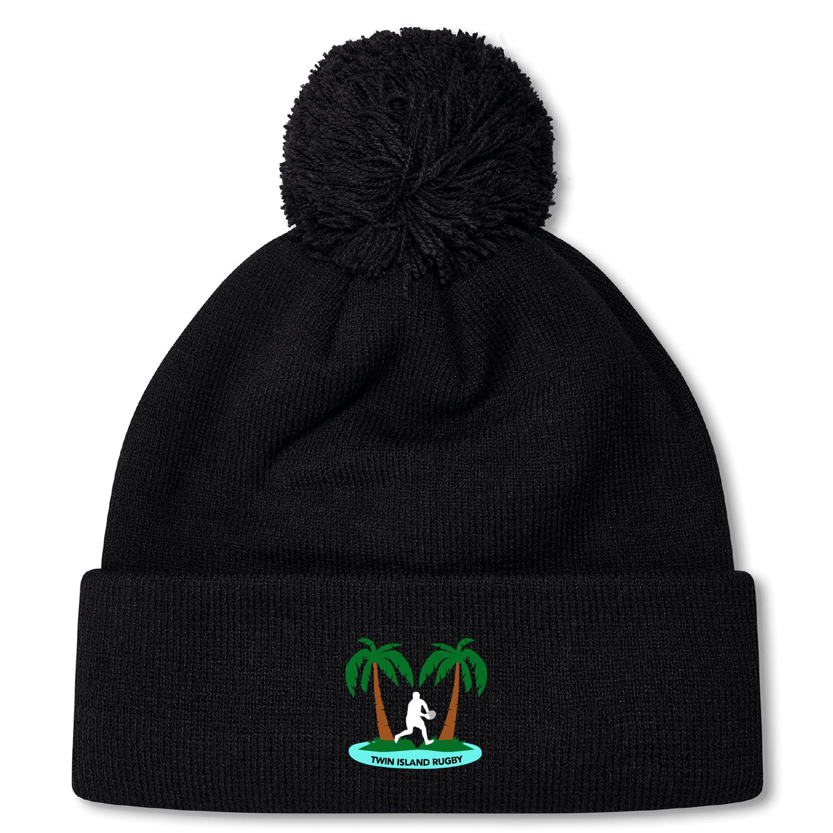 Stay warm in the Twin Island Rugby Pom Pom Beanie by EMB Canterbury. This black knit, fleece-lined beanie features a pom-pom, embroidered rugby player between two palm trees, and "TWIN ISLAND RUGBY" text.