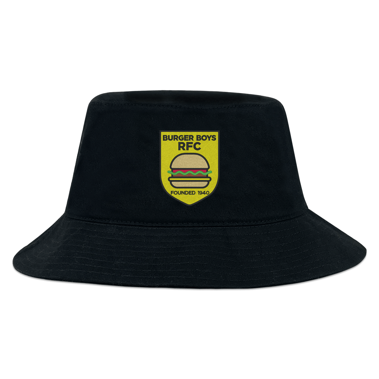 The EMB S&S Activewear Burger Boys RFC Crusher Bucket Cap is a black cotton twill hat with a yellow shield patch displaying "Burger Boys RFC," a burger icon, and "Founded 1940," offering classic style and sun protection.
