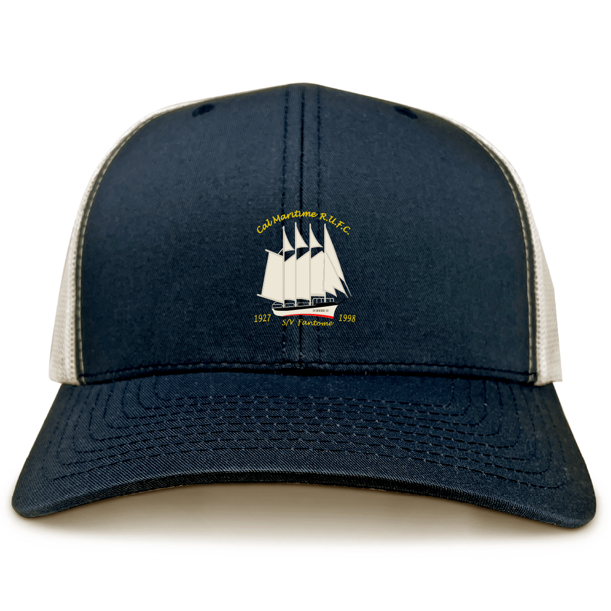 The EMB S&S Activewear Cal Maritime Rugby Retro Trucker Cap is a navy blue and white cap with an embroidered sailing ship and “Coldharbour R.F.L.C. 1927 S/V Tradewind 1998” on the front, finished with a classic snapback closure.