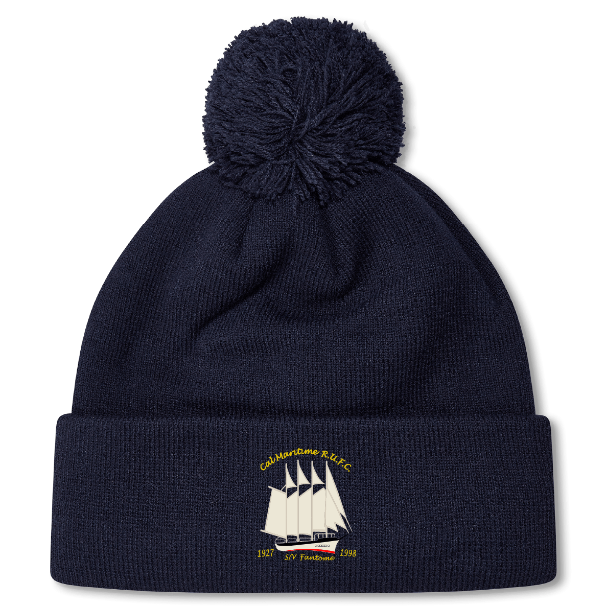 The Cal Maritime Rugby Pom Pom Beanie by EMB Canterbury features a navy design with a pom-pom, embroidered white sailing ship, gold "Cal Maritime RLLFC 1927 S/Y Fredawee 1998" text on the cuff, and cozy fleece lining for extra warmth.
