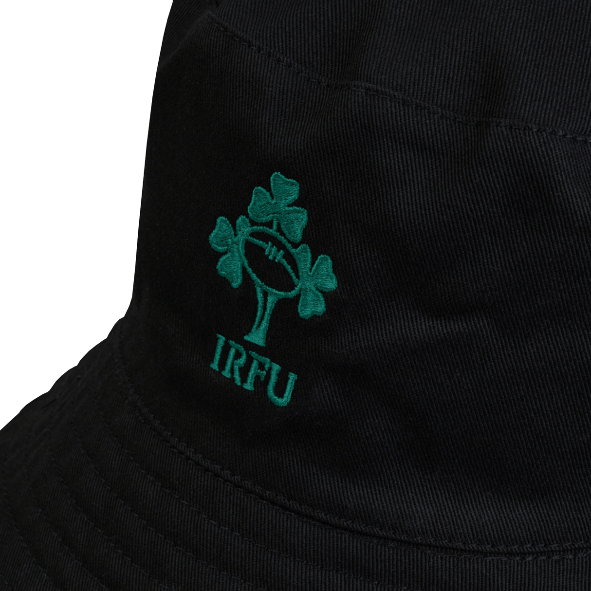 A black Ireland 24 Reversible Bucket Hat by Canterbury with a green embroidered logo featuring three shamrocks, a rugby ball, and the letters "IRFU" underneath.