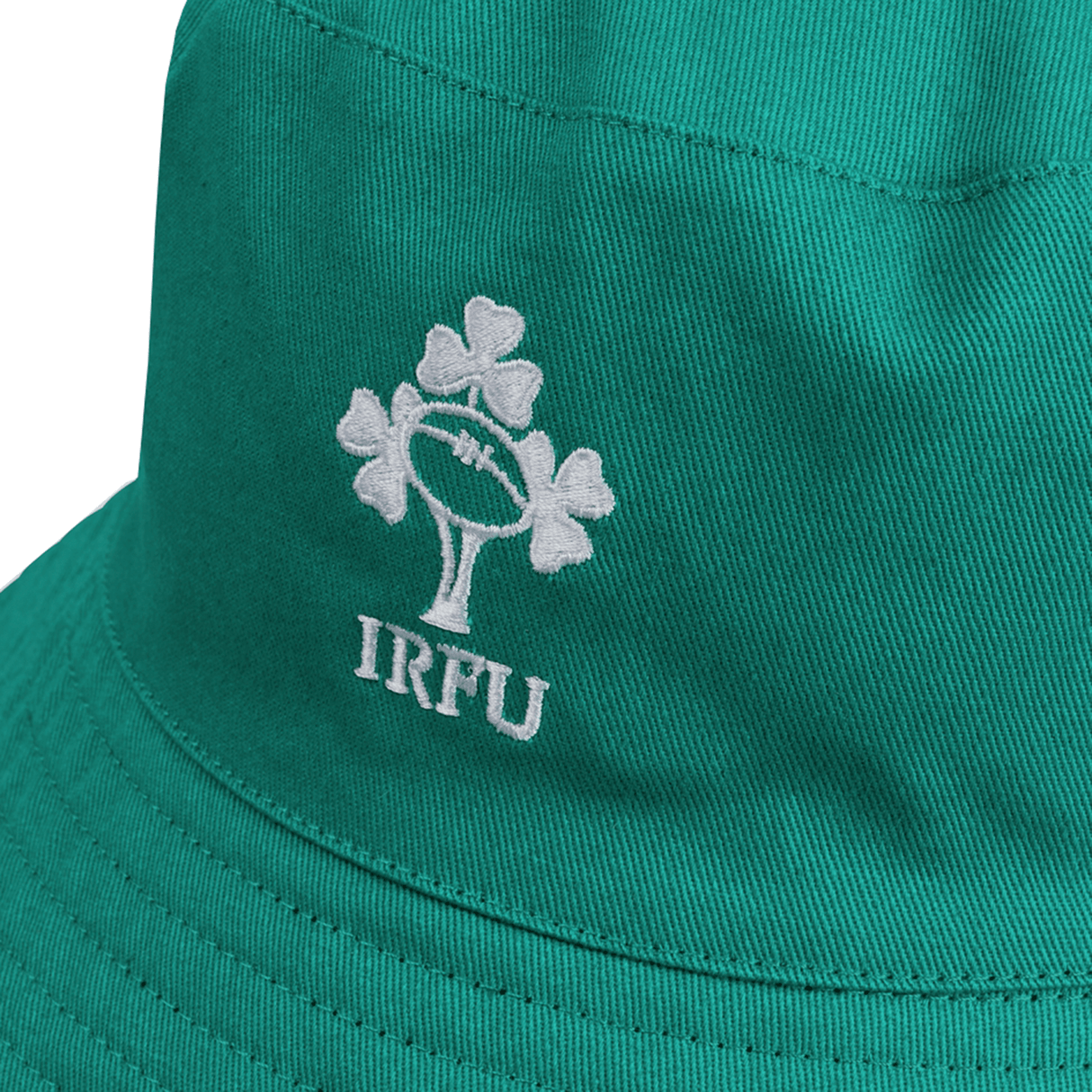 Close-up of the Ireland 24 Reversible Bucket Hat by Canterbury featuring the IRFU logo embroidered in white. The logo includes a rugby ball surrounded by shamrocks. Perfect for showing your support for Ireland 24/7.