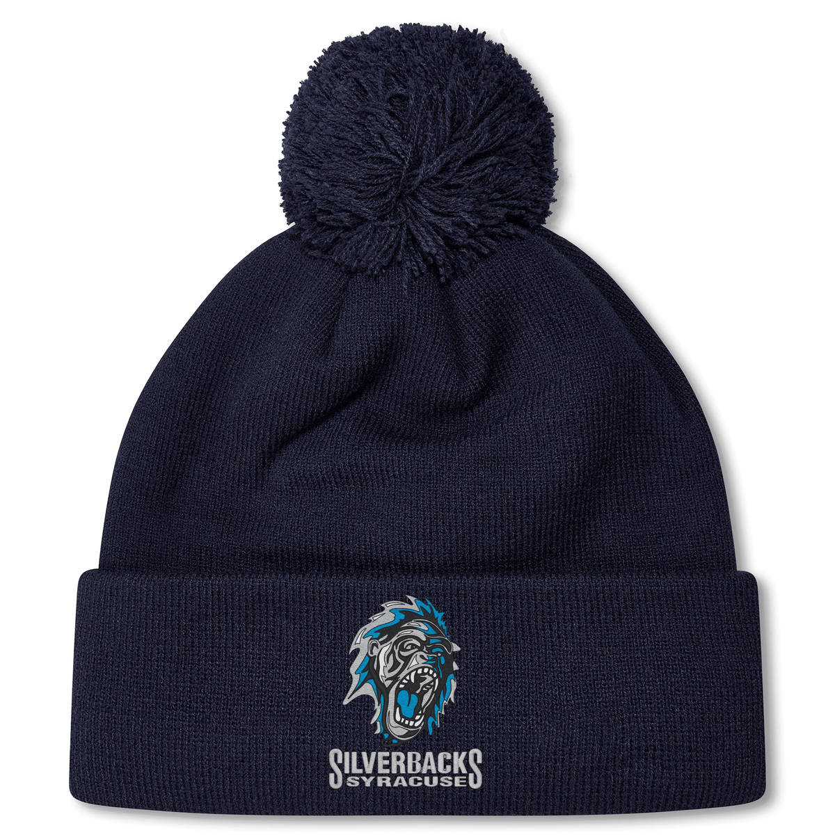 Navy blue knit beanie with a pom-pom on top, featuring the embroidered logo of a roaring gorilla and the text "Silverbacks Syracuse" on the front fold. This cozy fleece-lined Syracuse Silverbacks Pom Pom Beanie by Canterbury ensures warmth while showcasing your team pride.
