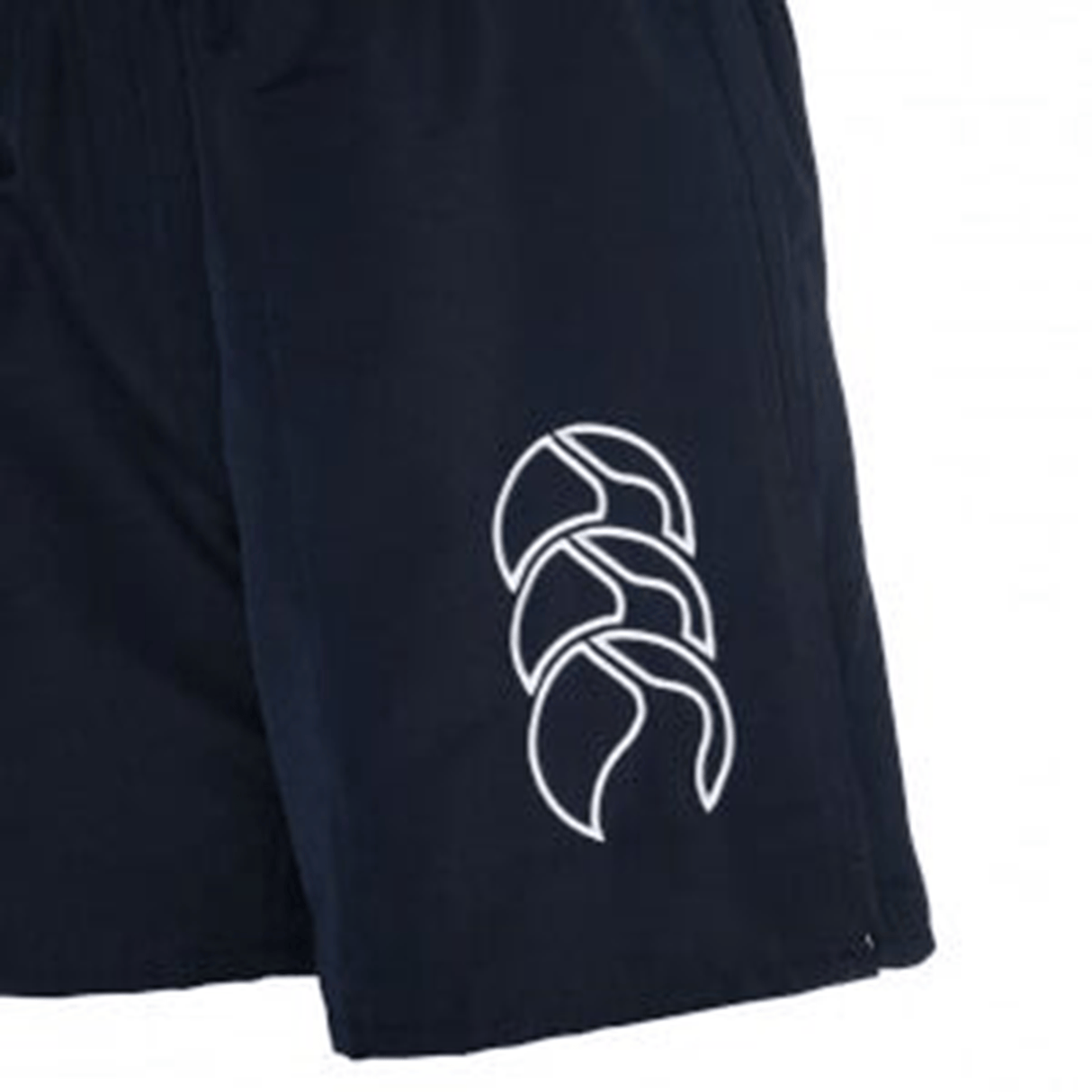 The Canterbury Women's Tactic Short is a navy blue athletic short with a white abstract triple-leaf logo on the left thigh.