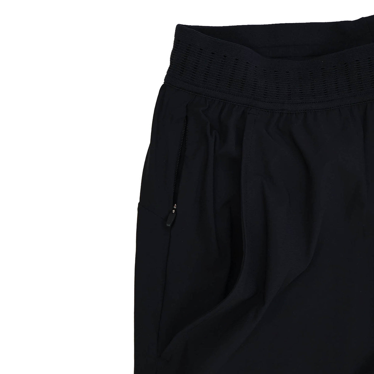 The Ireland 25/26 Gym Training Pant by Canterbury is displayed on a plain white background, photographed from the waist to the thigh. These black athletic pants feature an elastic waistband and a zippered pocket, taking inspiration from Ireland Rugby training wear.