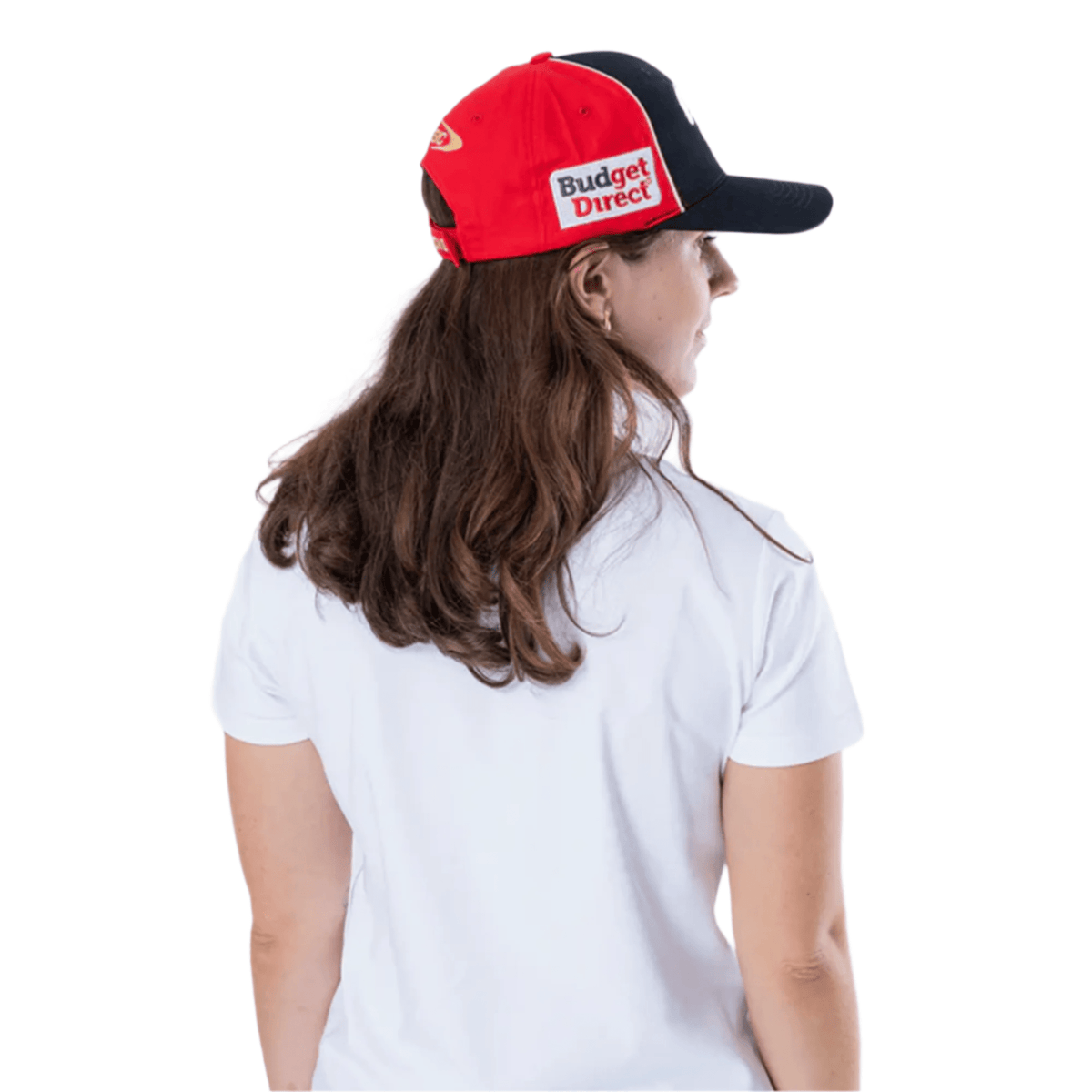 A person in a white shirt wearing a Dolphins NRL 25/26 Media Cap by Classic Sportswear, red and black accents, and a "Budget Direct" logo on the back.