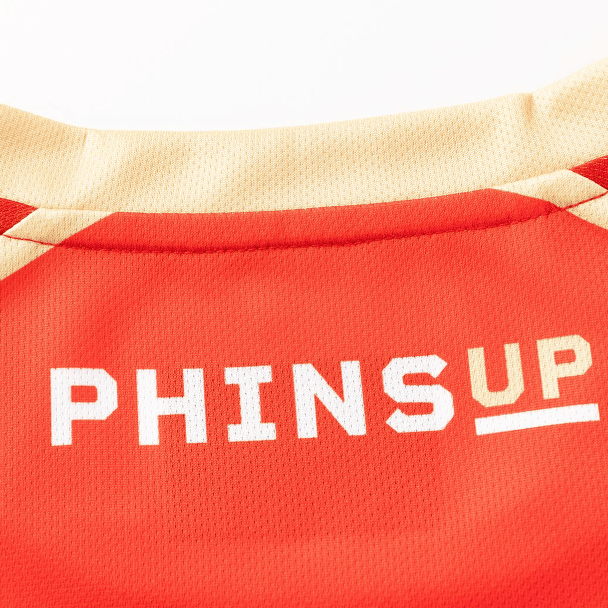 Close-up of the Dolphins NRL 26/27 Replica Home Jersey by Classic Sportswear, showing “PHINS UP” in white and gold on the back near the collar—a signature detail of this authentic replica.