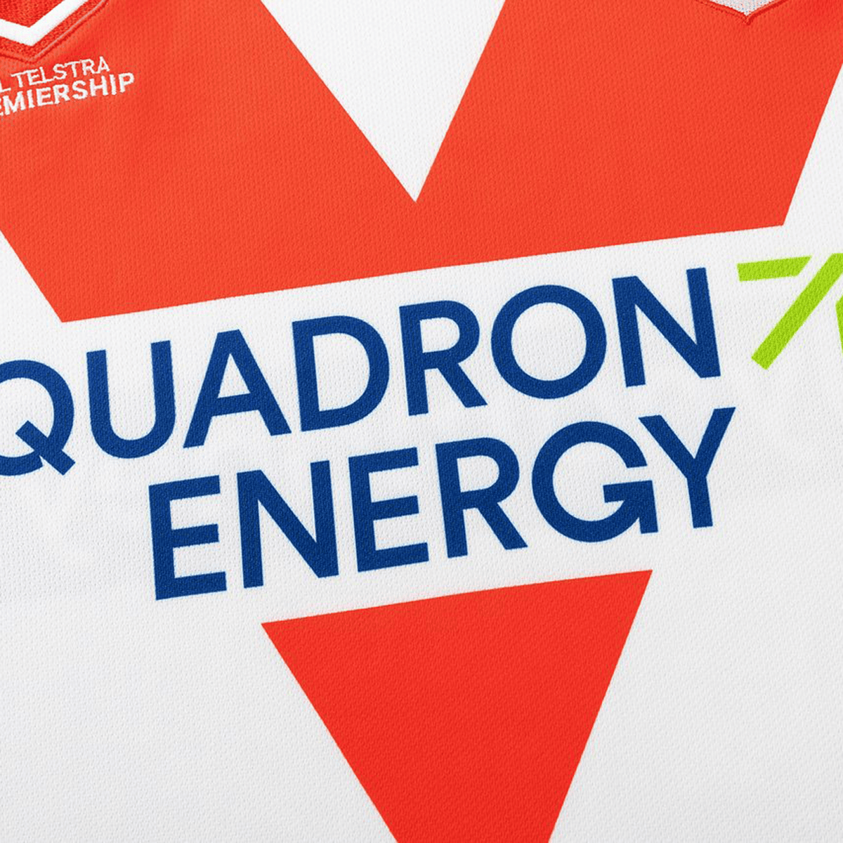 Close-up of the Dragons NRL 26/27 Replica Home Jersey by Classic Sportswear, featuring a red "V", bold blue QUADRON ENERGY logo, and TELSTRA PREMIERSHIP text—highlighting premium Classic Sportswear rugby design.