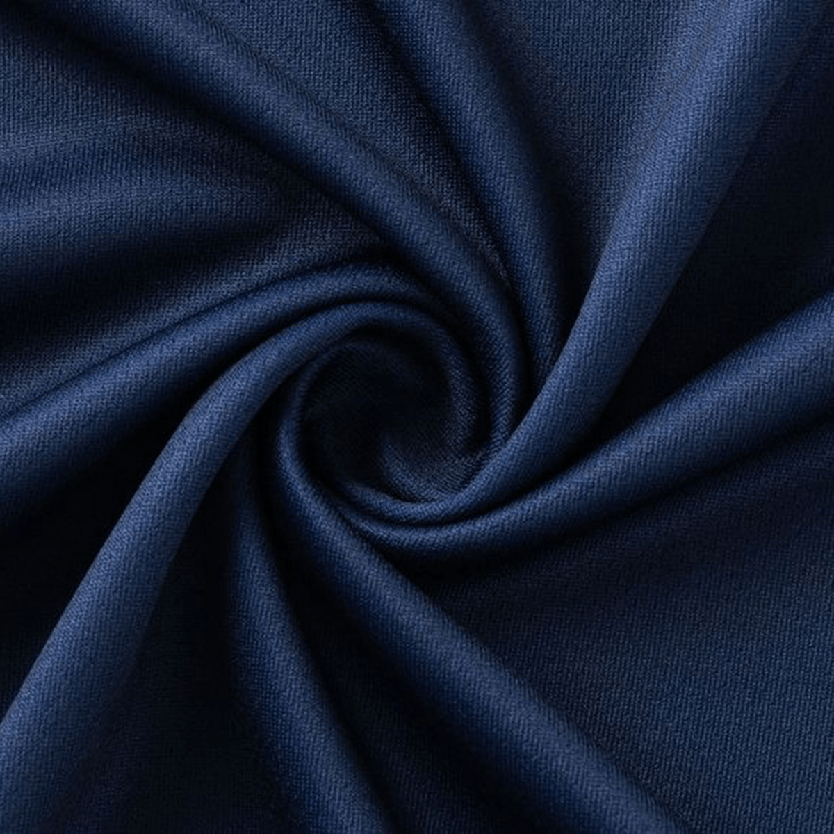 Close-up of the Highlanders Super Rugby Team Polo 25/26 fabric by Classic Sportswear, showcasing its dark blue moisture-wicking texture twisted into a spiral pattern, reminiscent of traditional rugby polos.