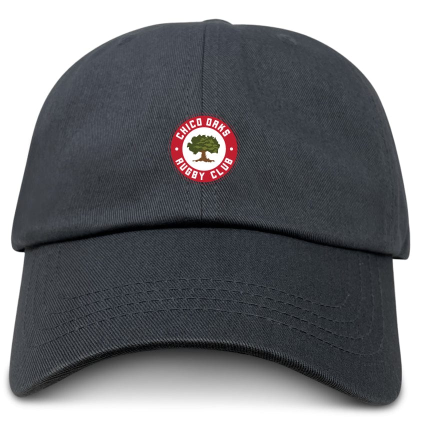 The Chico Oaks Adult Low-Profile Cotton Twill Dad Cap by EMB S&S Activewear features an embroidered round red and white "Chico Oaks Rugby Club" logo with a green oak tree on the front.